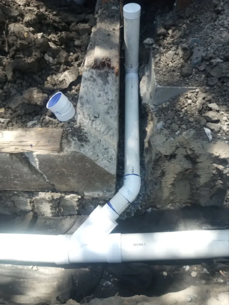 Strom Drain with riser that will tie into a rain gutter downspout
